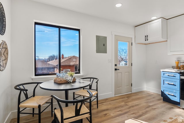 223 N Harrison Blvd, Ogden, UT 84404 - dining room featuring baseboards, recessed lighting, electric panel, and light wood-type flooring