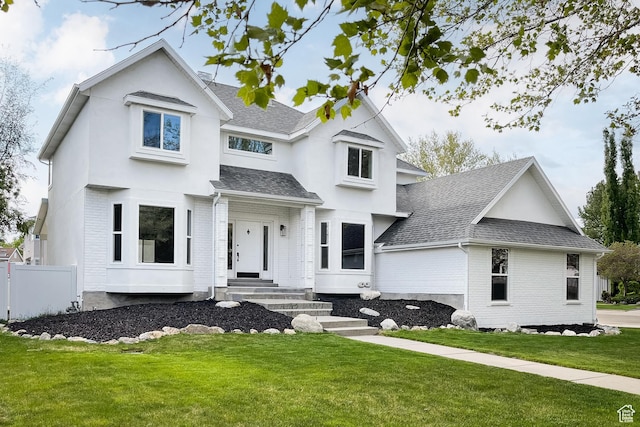 5188 S Saddleback Dr, Holladay, UT 84117 - modern farmhouse featuring brick siding, roof with shingles, a front yard, and fence