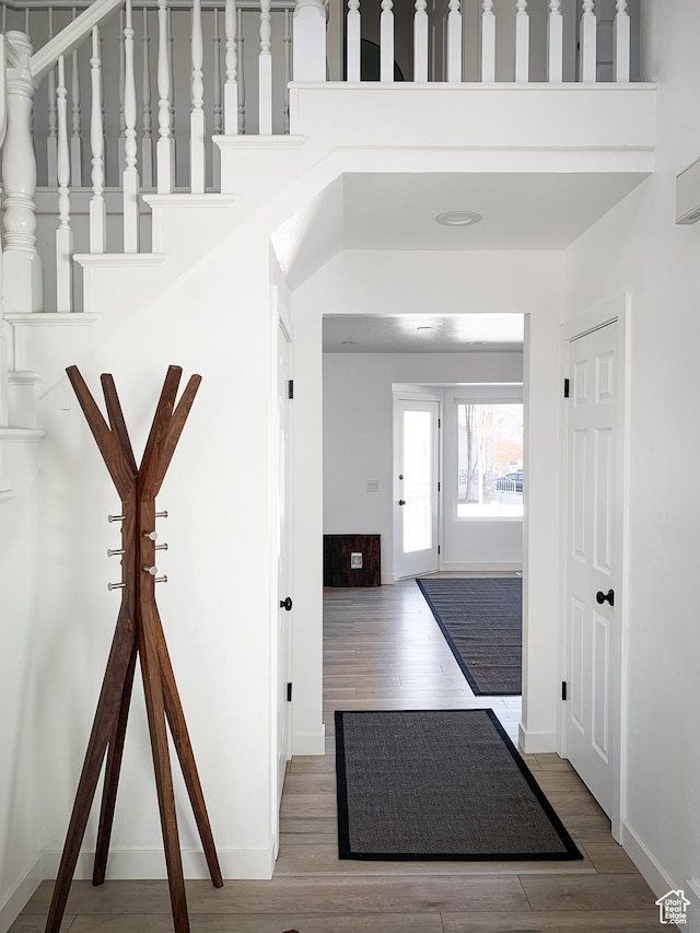 5188 S Saddleback Dr, Holladay, UT 84117 - entryway featuring baseboards and wood finished floors
