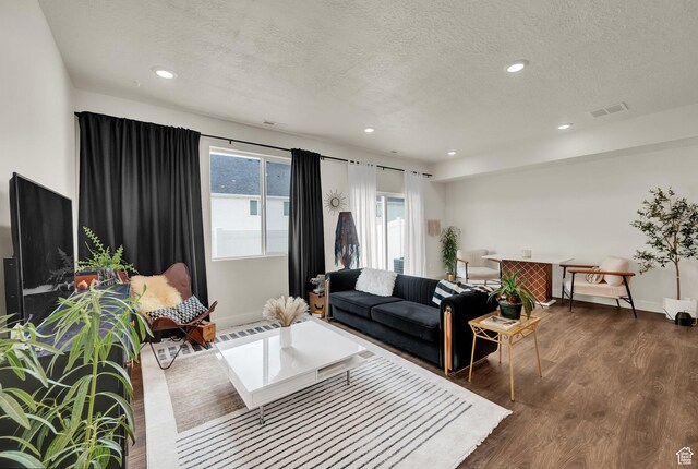 499 N 420 W Unit 138, Lindon, UT 84042 - living area featuring visible vents, a textured ceiling, recessed lighting, and wood finished floors