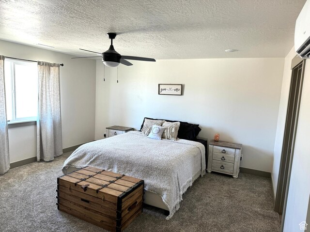 386 S Amber Field Dr Unit 508, Grantsville, UT 84029 - bedroom with carpet floors, baseboards, a wall mounted air conditioner, and ceiling fan