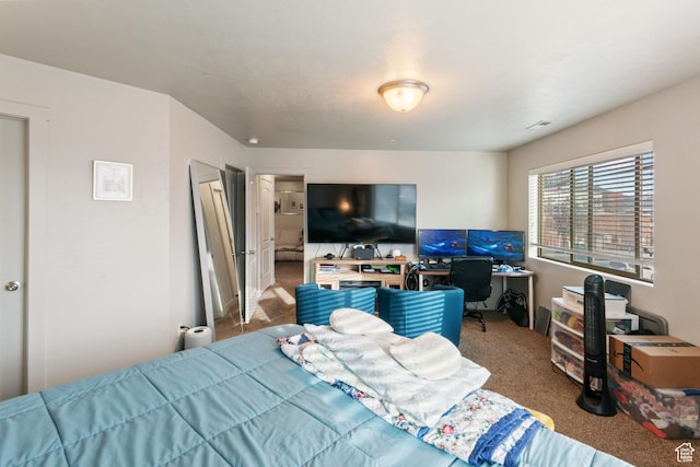bedroom featuring visible vents and carpet flooring
