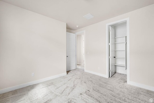 14913 S Thorntree Ln, Herriman, UT 84096 - unfurnished bedroom with baseboards, carpet floors, and a walk in closet