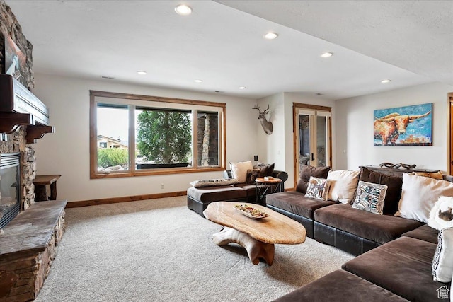 1049 S Meadow Lark Ln E, Huntsville, UT 84317 - carpeted living room featuring baseboards, recessed lighting, and a stone fireplace
