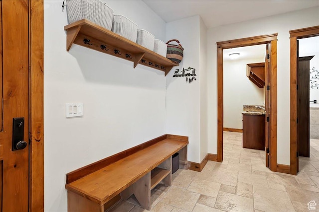 1049 S Meadow Lark Ln E, Huntsville, UT 84317 - mudroom featuring baseboards and stone tile floors