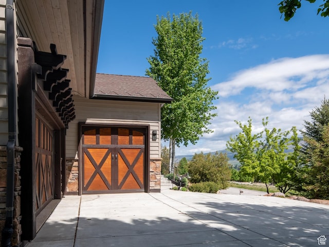 1049 S Meadow Lark Ln E, Huntsville, UT 84317 - view of outdoor structure featuring concrete driveway