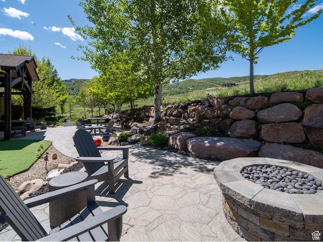 1049 S Meadow Lark Ln E, Huntsville, UT 84317 - view of patio with a fire pit