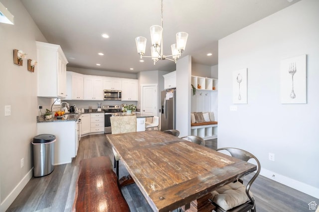 910 N 260 W, Santaquin, UT 84655 - dining room with dark wood-style flooring, baseboards, a chandelier, and recessed lighting