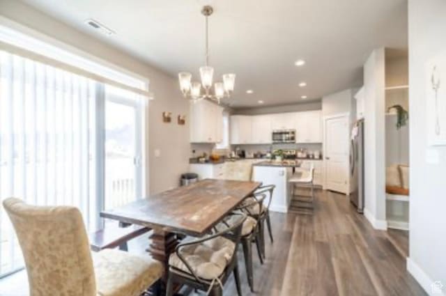 910 N 260 W, Santaquin, UT 84655 - dining room featuring recessed lighting, baseboards, dark wood-style floors, visible vents, and a notable chandelier