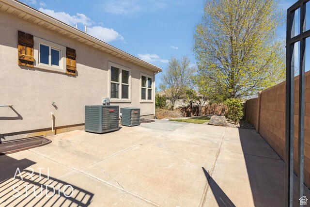 2445 E 2860 S, St George, UT 84790 - view of patio with a fenced backyard and central AC