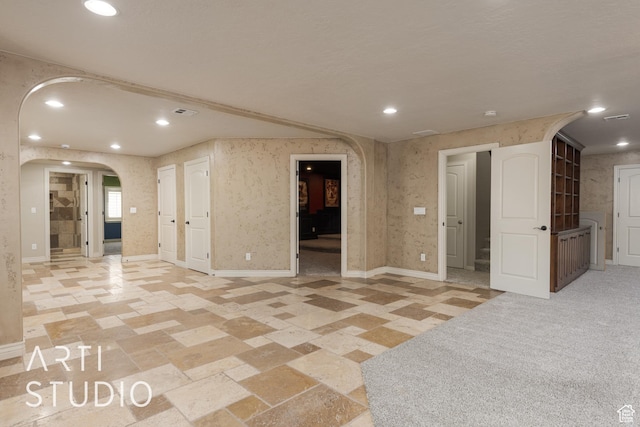 2445 E 2860 S, St George, UT 84790 - unfurnished room featuring visible vents, arched walkways, baseboards, and recessed lighting