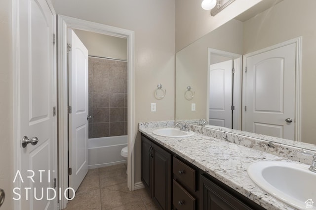 2445 E 2860 S, St George, UT 84790 - bathroom with double vanity, toilet, tile patterned flooring, and a sink