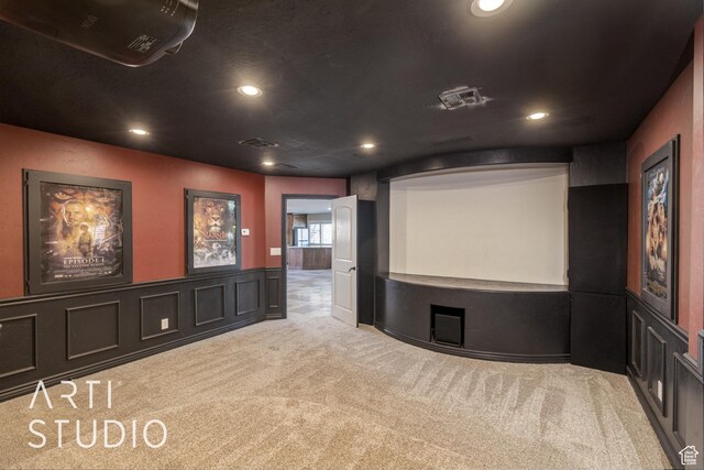 2445 E 2860 S, St George, UT 84790 - carpeted home theater room with a decorative wall, a wainscoted wall, visible vents, and recessed lighting