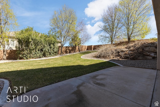 2445 E 2860 S, St George, UT 84790 - view of yard featuring a fenced backyard and a patio area