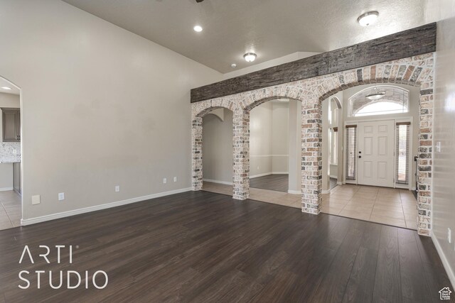 2445 E 2860 S, St George, UT 84790 - entrance foyer featuring arched walkways, baseboards, and wood finished floors