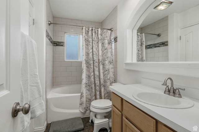 full bath with toilet, vanity, and shower / tub combo