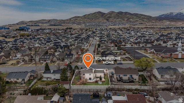 aerial view with a residential view and a mountain view