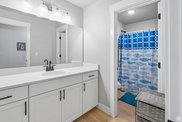 3161 N 3150 W, Plain City, UT 84404 - bathroom featuring a shower with curtain, toilet, wood finished floors, and vanity
