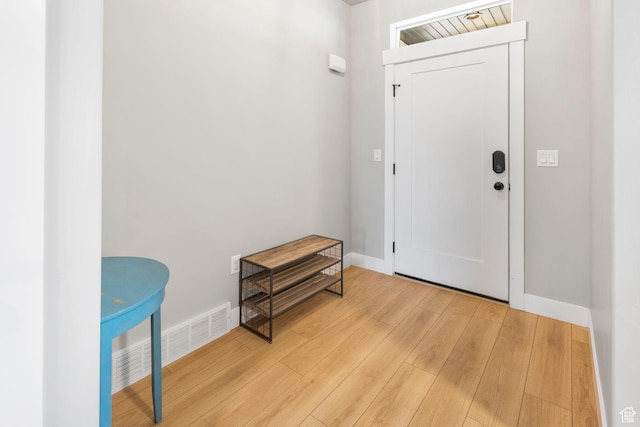 3161 N 3150 W, Plain City, UT 84404 - entryway featuring baseboards, visible vents, and wood finished floors