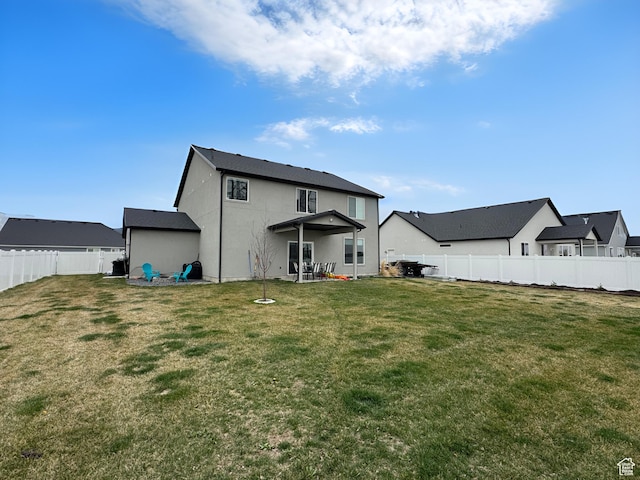 3161 N 3150 W, Plain City, UT 84404 - rear view of house with a fenced backyard and a yard