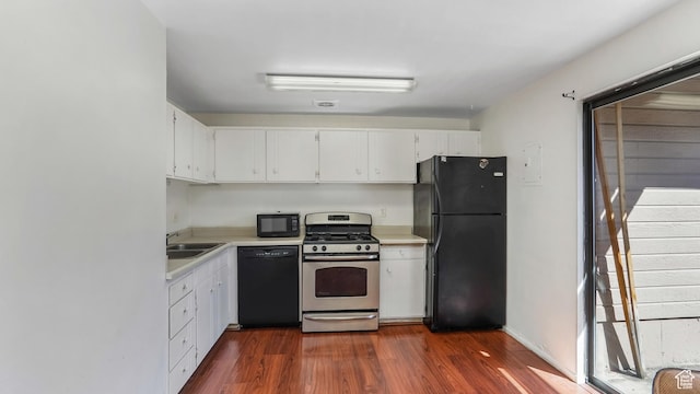 1423 Arthur Dr, Provo, UT 84601 - kitchen featuring a sink, light countertops, black appliances, and dark wood finished floors