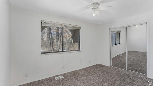 1423 Arthur Dr, Provo, UT 84601 - unfurnished bedroom with a closet, carpet floors, baseboards, visible vents, and ceiling fan