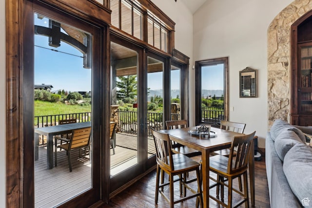7507 Sage Meadow Rd, Park City, UT 84098 - dining room featuring plenty of natural light, dark wood finished floors, and a towering ceiling