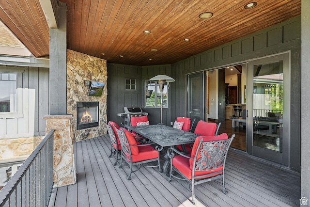 7507 Sage Meadow Rd, Park City, UT 84098 - deck featuring an outdoor stone fireplace and outdoor dining area