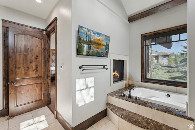 7507 Sage Meadow Rd, Park City, UT 84098 - full bath featuring tile patterned flooring, a bath, healthy amount of natural light, baseboards, and lofted ceiling