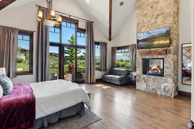 7507 Sage Meadow Rd, Park City, UT 84098 - bedroom featuring a fireplace, high vaulted ceiling, and wood finished floors
