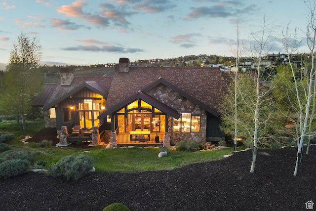 7507 Sage Meadow Rd, Park City, UT 84098 - rear view of house with stone siding and a chimney