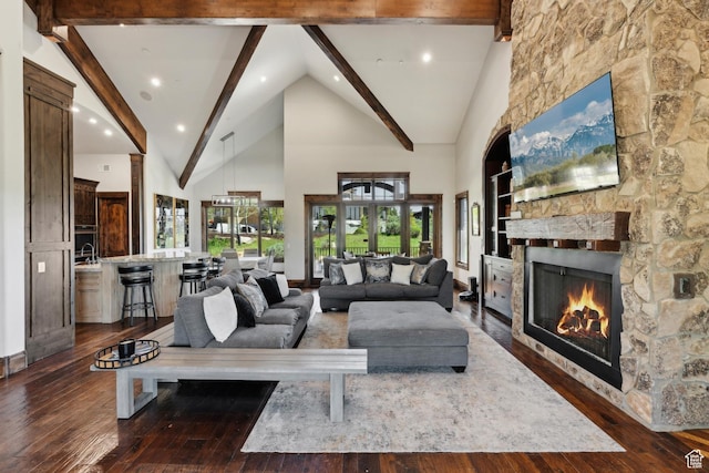 7507 Sage Meadow Rd, Park City, UT 84098 - living room featuring a fireplace, beam ceiling, dark wood-style flooring, high vaulted ceiling, and recessed lighting