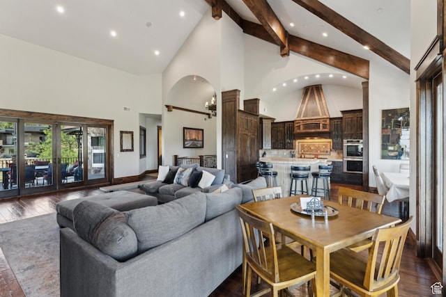 7507 Sage Meadow Rd, Park City, UT 84098 - living area featuring high vaulted ceiling, beamed ceiling, arched walkways, dark wood-style floors, and recessed lighting