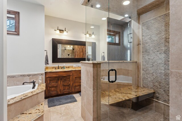 7507 Sage Meadow Rd, Park City, UT 84098 - full bath featuring vanity, a shower stall, a garden tub, tile patterned floors, and recessed lighting