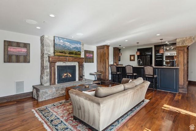 7507 Sage Meadow Rd, Park City, UT 84098 - living room with dark wood-style floors, a fireplace, recessed lighting, baseboards, and wet bar