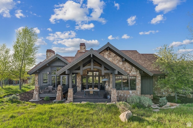 7507 Sage Meadow Rd, Park City, UT 84098 - back of property featuring stone siding and a chimney
