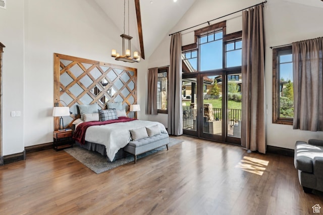 7507 Sage Meadow Rd, Park City, UT 84098 - bedroom with high vaulted ceiling, wood finished floors, access to outside, and baseboards