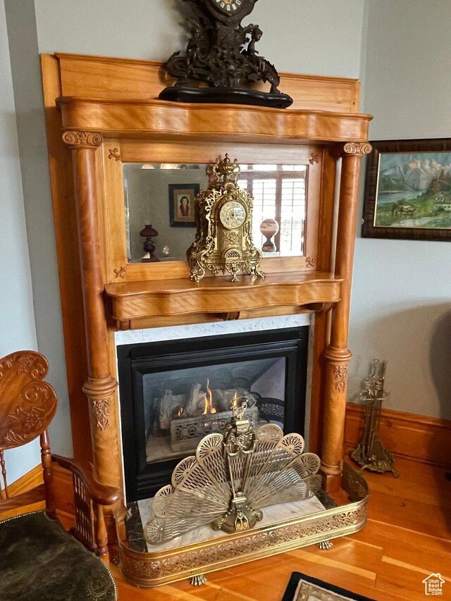 368 E 300 N, Logan, UT 84321 - interior details featuring wood finished floors, a high end fireplace, and baseboards