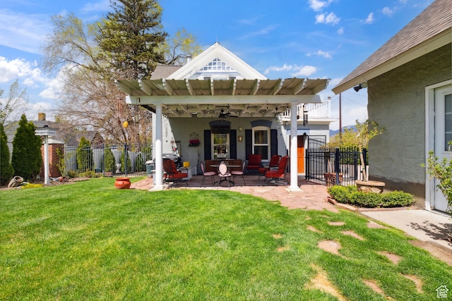368 E 300 N, Logan, UT 84321 - rear view of house featuring a patio, fence, ceiling fan, and a yard