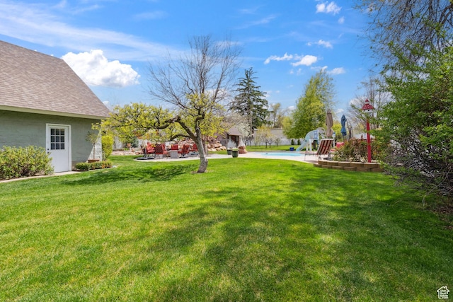 368 E 300 N, Logan, UT 84321 - view of yard featuring a patio and a fenced in pool