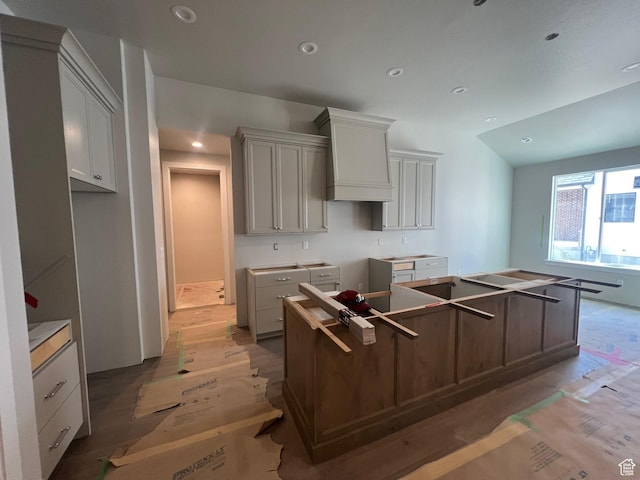 551 W Summerhill Ln, Centerville, UT 84014 - kitchen featuring recessed lighting, custom range hood, light wood-style flooring, and a kitchen island