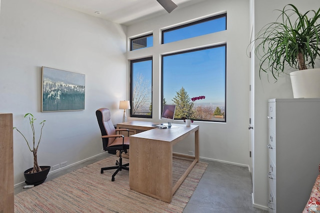 office space featuring baseboards