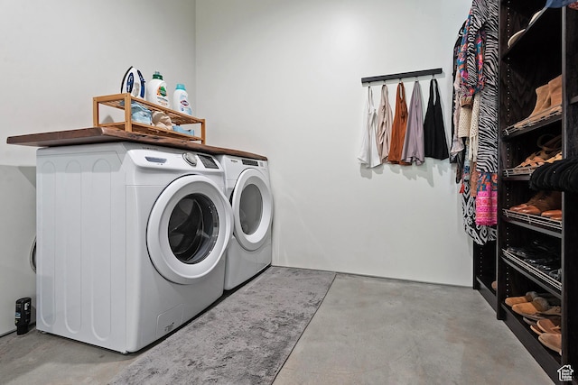 laundry area featuring independent washer and dryer and laundry area