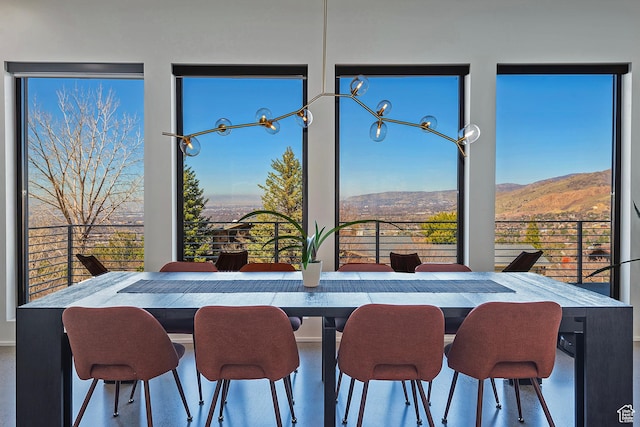 dining area featuring a mountain view