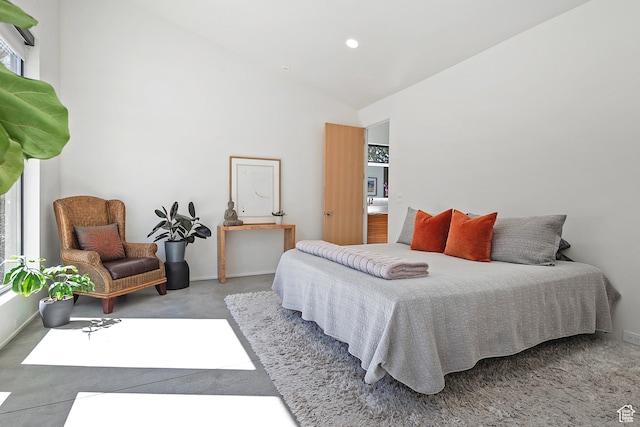 bedroom with recessed lighting, high vaulted ceiling, baseboards, and finished concrete floors