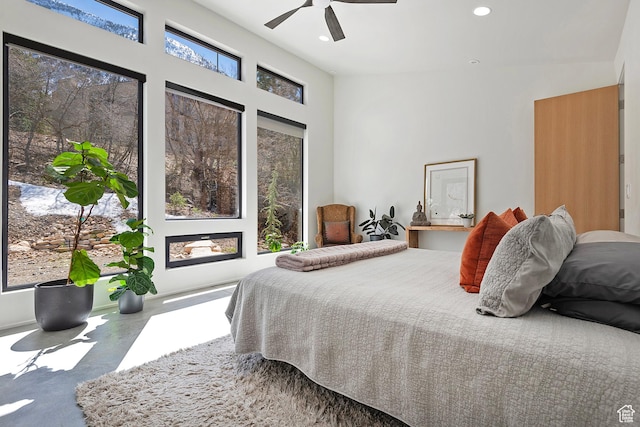 bedroom with ceiling fan and recessed lighting