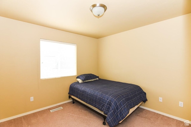 202 E Aparicio Dr, Tooele, UT 84074 - bedroom featuring baseboards, visible vents, and carpet