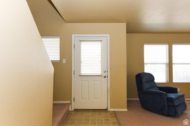 202 E Aparicio Dr, Tooele, UT 84074 - doorway with baseboards and light colored carpet