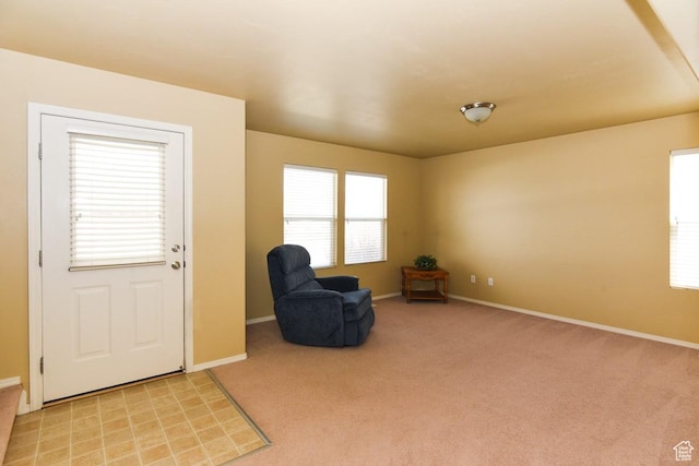 202 E Aparicio Dr, Tooele, UT 84074 - living area with baseboards and light colored carpet