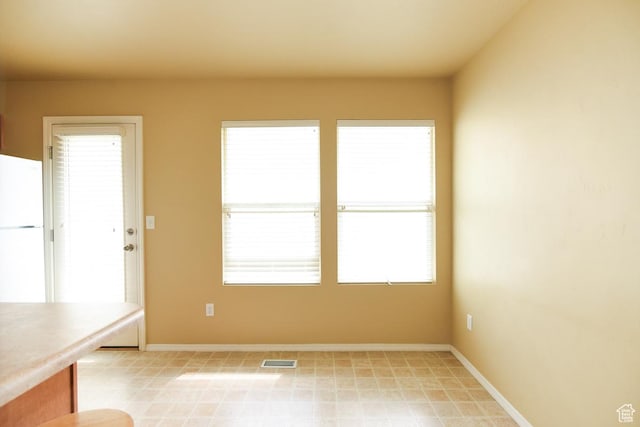 202 E Aparicio Dr, Tooele, UT 84074 - interior space with baseboards and visible vents